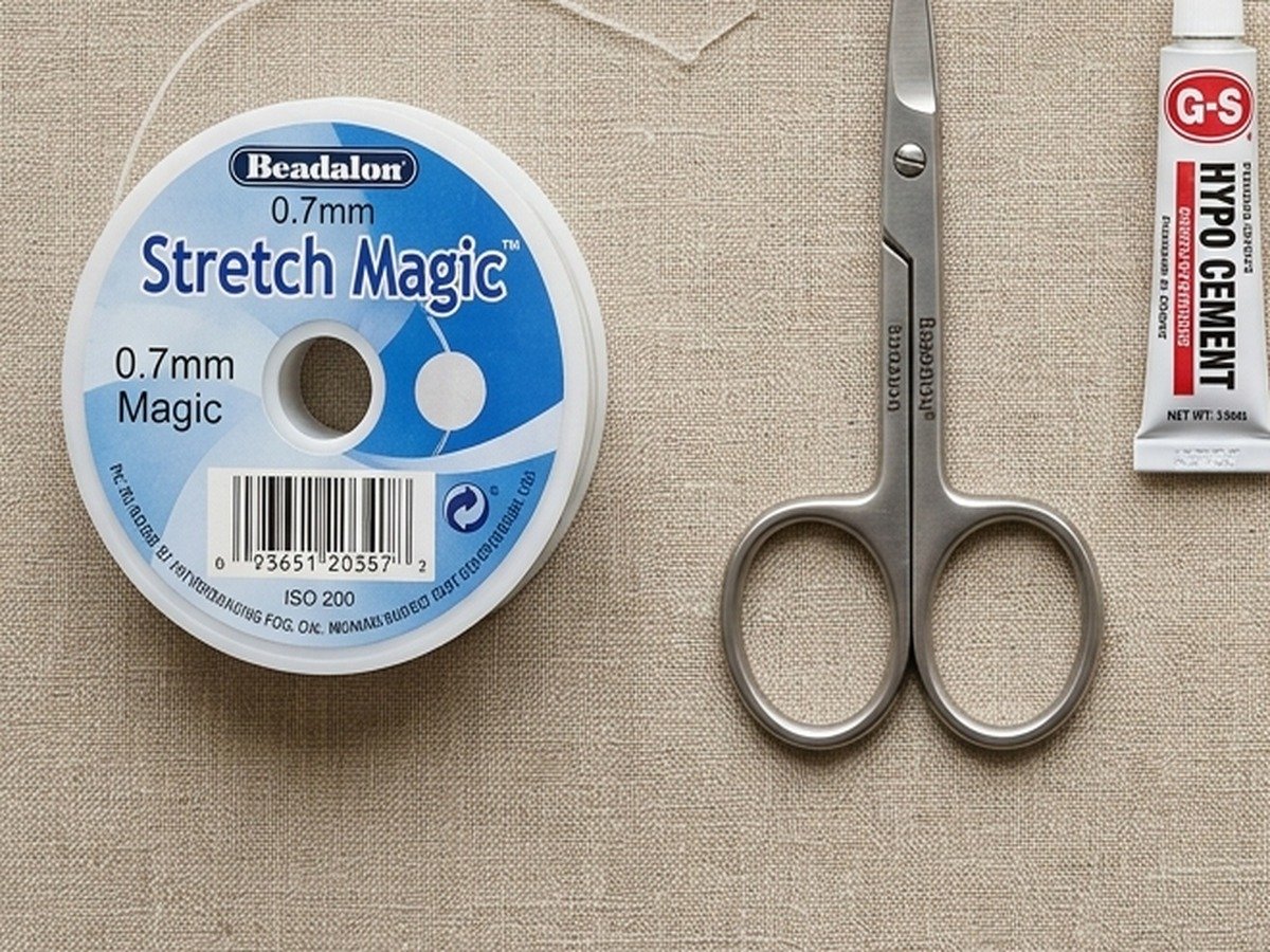 Beadalon 0.7mm Stretch Magic clear elastic cord spool and G-S Hypo Cement precision glue tube for durable beaded bracelets
